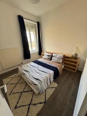 Un ou plusieurs lits dans un hébergement de l'établissement Appartement 3 chambres 6 personnes