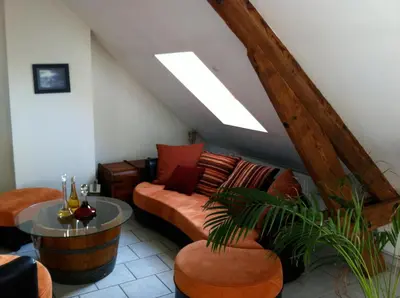 Coin salon dans l'établissement Grand Appartement Chill