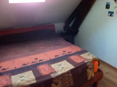 Un ou plusieurs lits dans un hébergement de l'établissement Grand Appartement Chill