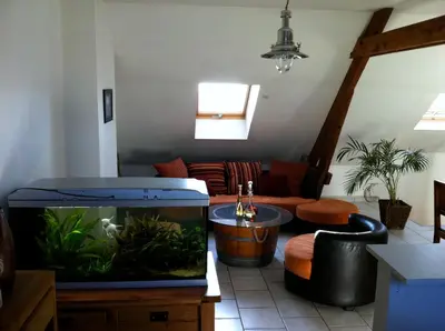 Coin salon dans l'établissement Grand Appartement Chill