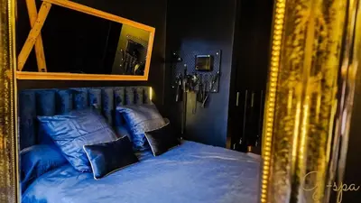 Un ou plusieurs lits dans un hébergement de l'établissement Love Room G-Spa private
