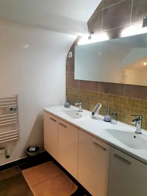 Salle de bains dans l'établissement L'Alliance des Climats