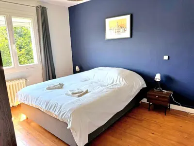Un ou plusieurs lits dans un hébergement de l'établissement Rare ! Maison face à l'étang d'Isle