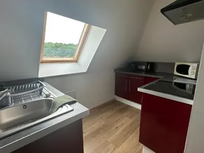 Cuisine ou kitchenette dans l'établissement Appartement T3