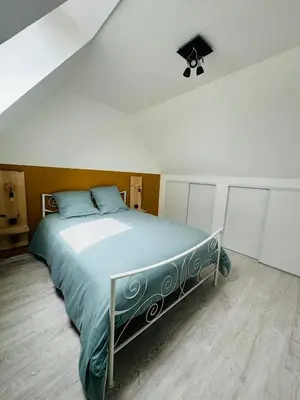 Un ou plusieurs lits dans un hébergement de l'établissement Appartement T3