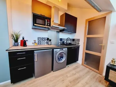 Cuisine ou kitchenette dans l'établissement 1 clémence fouriaux proche gare et climatisé
