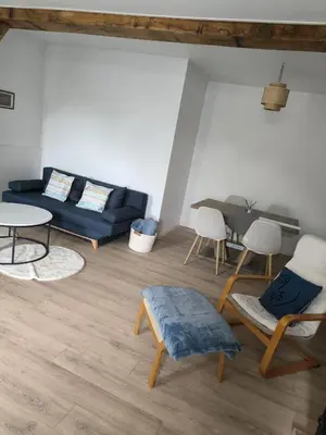 Coin salon dans l'établissement La Maison bleue Paissy