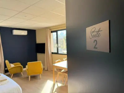 Coin salon dans l'établissement Suite du Spa 2 - Parking Privé Gratuit