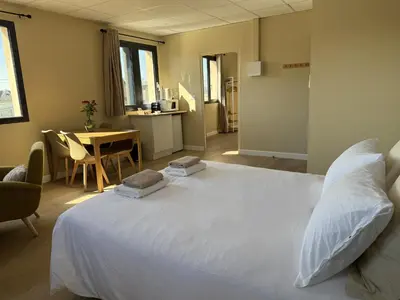 Un ou plusieurs lits dans un hébergement de l'établissement Suite du Spa 2 - Parking Privé Gratuit