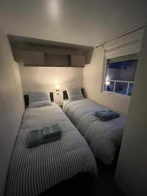 Un ou plusieurs lits dans un hébergement de l'établissement bungalow de l'escaut