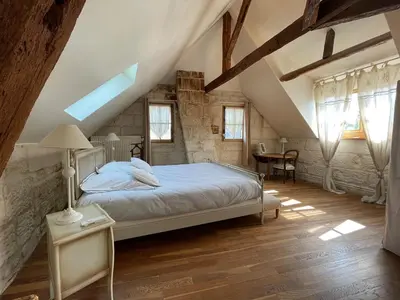 Un ou plusieurs lits dans un hébergement de l'établissement La Maison Bleue