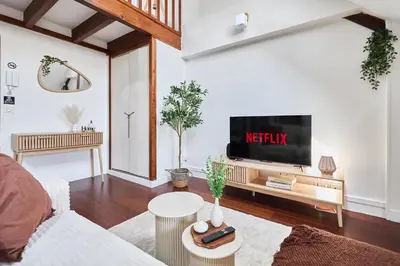 Télévision ou salle de divertissement dans l'établissement Le Loft de la Porte de Mars - à 5 min de la gare