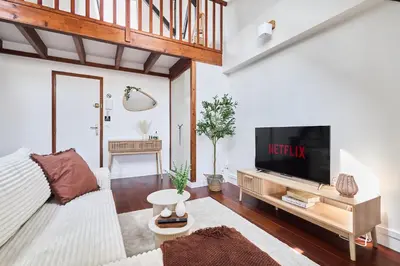 Télévision ou salle de divertissement dans l'établissement Le Loft de la Porte de Mars - à 5 min de la gare