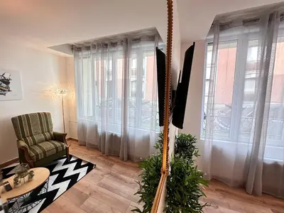 Coin salon dans l'établissement Le repère dAlice T2 cosy proche centre