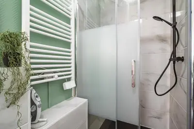 Salle de bains dans l'établissement Le cosy - charmant 2 chambres - centre