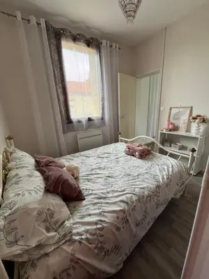 Un ou plusieurs lits dans un hébergement de l'établissement Petit coin de verdure au cœur de vitry