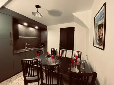 Cuisine ou kitchenette dans l'établissement La P'tite Maison Vaudon