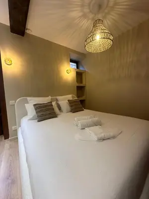 Un ou plusieurs lits dans un hébergement de l'établissement Suite Élan by CollectionAura - Hypercentre Charleville-Mézières