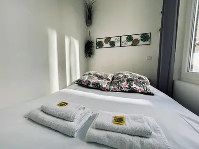 Un ou plusieurs lits dans un hébergement de l'établissement Chavalliaud 4 studio tout mignon proche centre