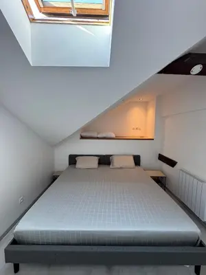 Un ou plusieurs lits dans un hébergement de l'établissement L'Horizon Silencieux Loft