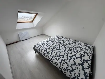 Un ou plusieurs lits dans un hébergement de l'établissement L'Horizon Silencieux Loft