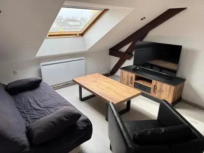 Coin salon dans l'établissement L'Horizon Silencieux Loft