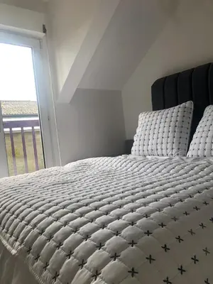 Un ou plusieurs lits dans un hébergement de l'établissement HSH France Chambre City 3 Proche de Disney