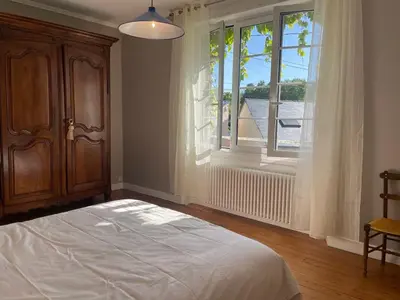 Un ou plusieurs lits dans un hébergement de l'établissement Le Clos des Fontenis 15p Spa Famille Nature
