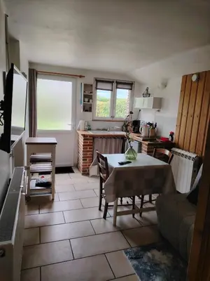 Télévision ou salle de divertissement dans l'établissement Gite du Baty