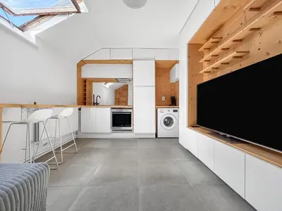Cuisine ou kitchenette dans l'établissement Studio lumineux et cosy, proche sites touristiques