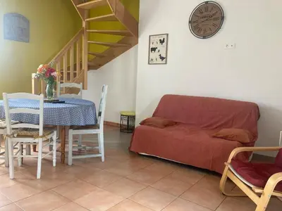 Coin salon dans l'établissement Jolie petite maison de campagne