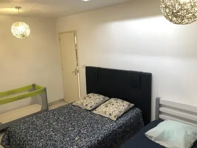 Un ou plusieurs lits dans un hébergement de l'établissement Chez Tatie charmante Maison de plein pieds
