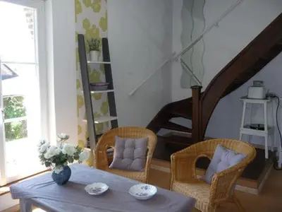 Coin salon dans l'établissement Gîte à la ferme