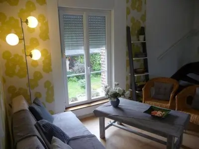 Coin salon dans l'établissement Gîte à la ferme