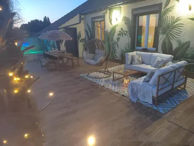 Coin salon dans l'établissement Le Chalet Tropical