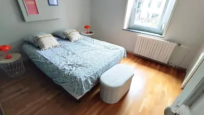 Un ou plusieurs lits dans un hébergement de l'établissement La maison du voyageur toque
