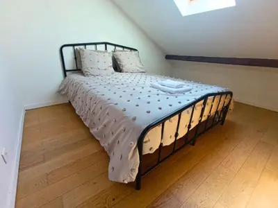 Un ou plusieurs lits dans un hébergement de l'établissement La Maison du Sapin