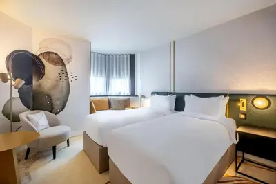 Un ou plusieurs lits dans un hébergement de l'établissement Hyatt Centric Reims