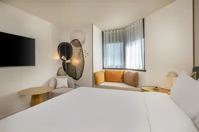 Un ou plusieurs lits dans un hébergement de l'établissement Hyatt Centric Reims