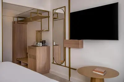 Télévision ou salle de divertissement dans l'établissement Hyatt Centric Reims