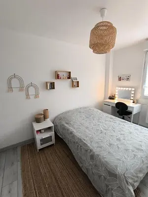 Un ou plusieurs lits dans un hébergement de l'établissement Maison 4 chambres