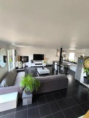 Coin salon dans l'établissement Maison 4 chambres