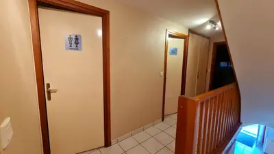 Télévision ou salle de divertissement dans l'établissement Gîte LE LOUP