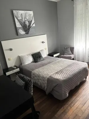 Un ou plusieurs lits dans un hébergement de l'établissement Hôtel Le Pont de l'Aube