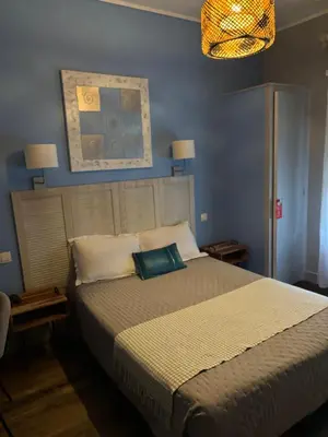 Un ou plusieurs lits dans un hébergement de l'établissement Hôtel Le Pont de l'Aube