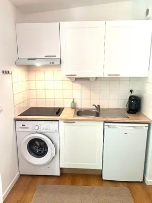 Cuisine ou kitchenette dans l'établissement Les Charmes - C09