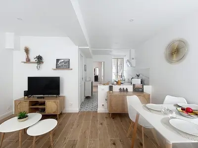Télévision ou salle de divertissement dans l'établissement L'Atelier Bottier- Voisin Château