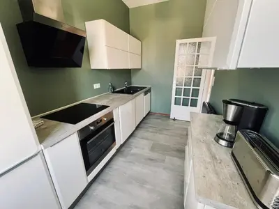 Cuisine ou kitchenette dans l'établissement Chez Margot