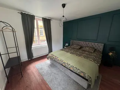 Un ou plusieurs lits dans un hébergement de l'établissement Appartement Sedan