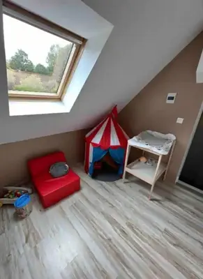 Un ou plusieurs lits dans un hébergement de l'établissement Pool House Champêtre